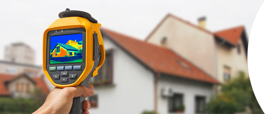 Thermal camera checking home efficiency.