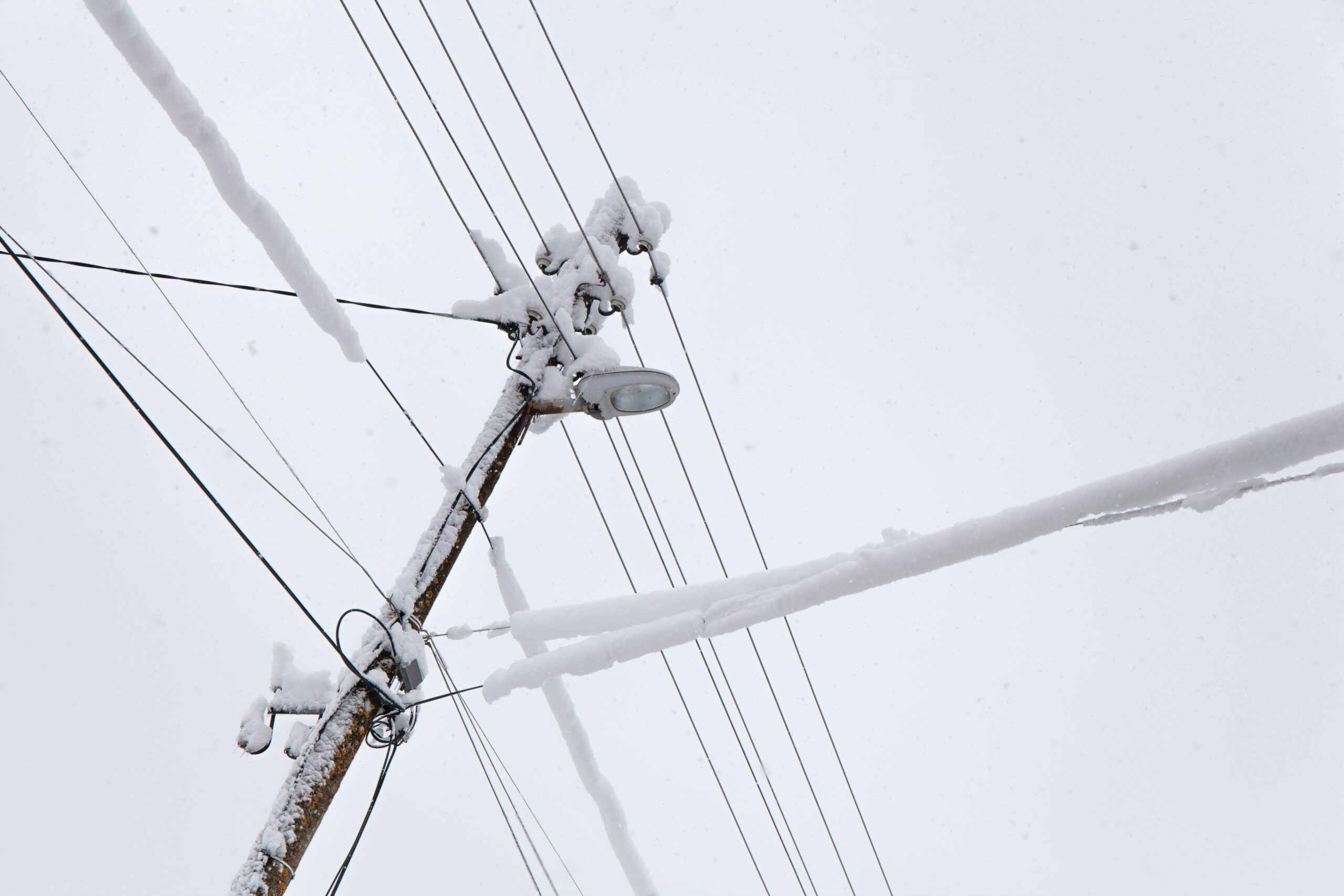frozen electric power pole
